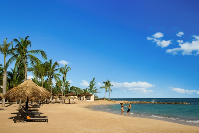 Hyatt-Zilara-Rose-Hall-Couple-Playing-Beach
