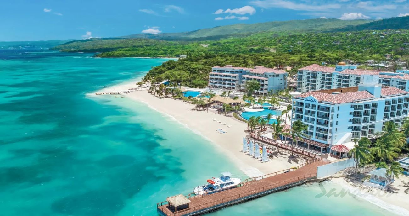 the beach and dock of sandals dunns rivers